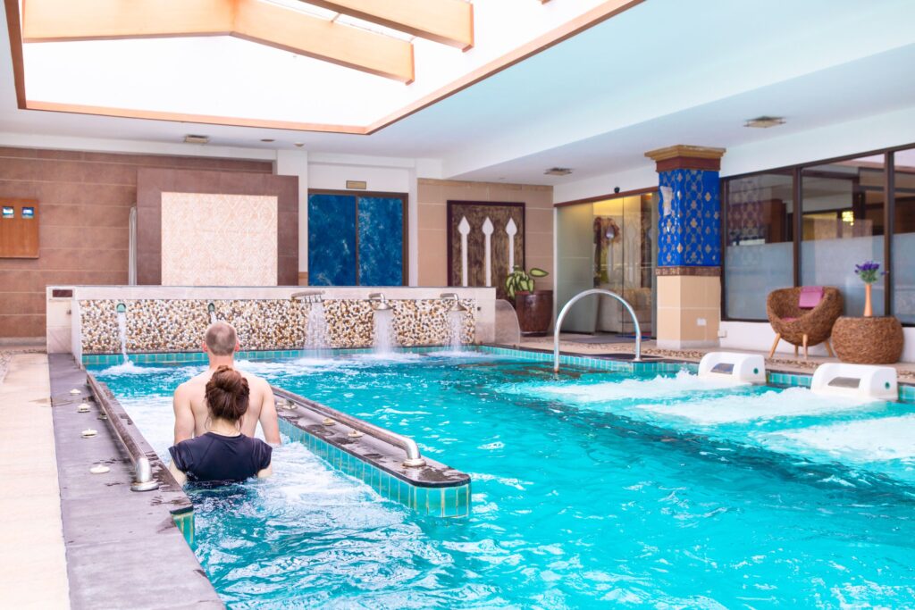 people in pool doing hydrotherapy